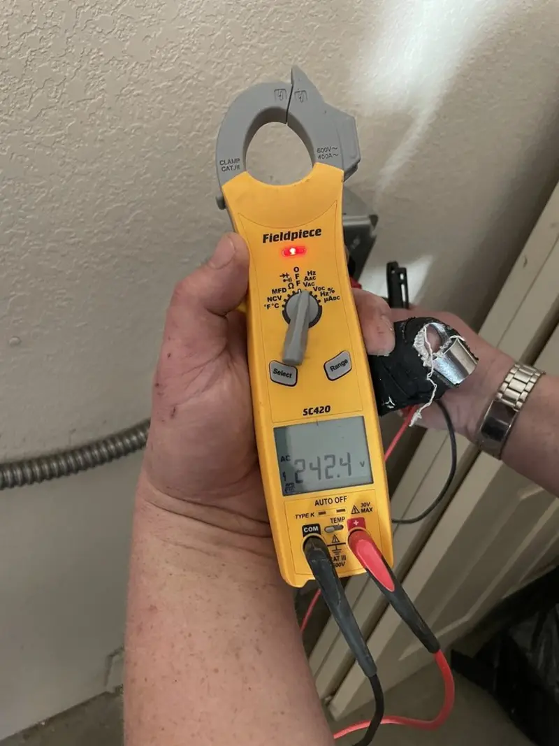 Voltage testing with clamp meter during Generator Installation in East Bakersfield